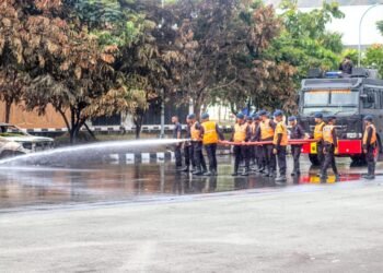Satbrimob Polda Papua Laksanakan Pembersihan dan Pemulihan Stadion Lukas Enembe 