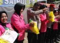 Bersama di Tengah Duka: SPN Polda Papua Berbagi untuk Korban Kebakaran Dok V